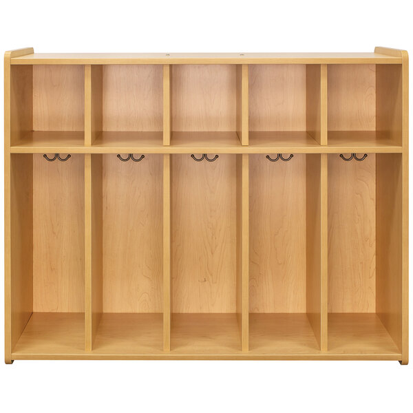 A maple laminate Tot Mate toddler floor locker with 5 compartments.