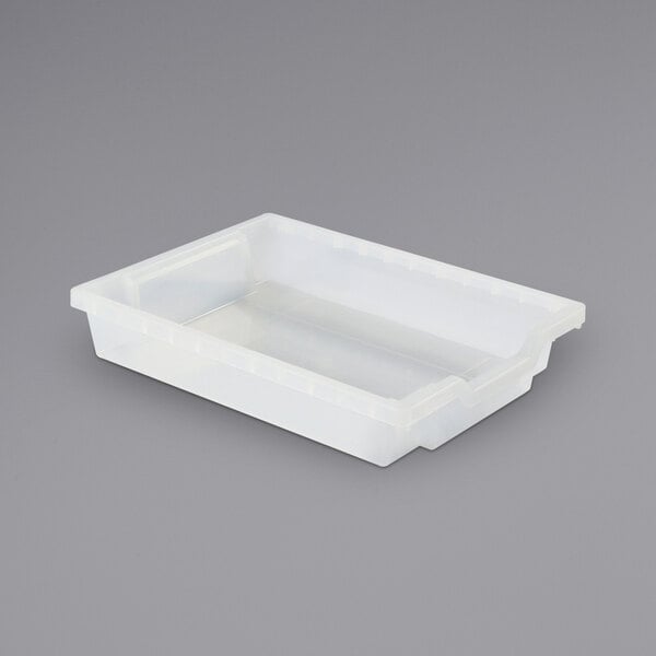 a plastic container on a gray background