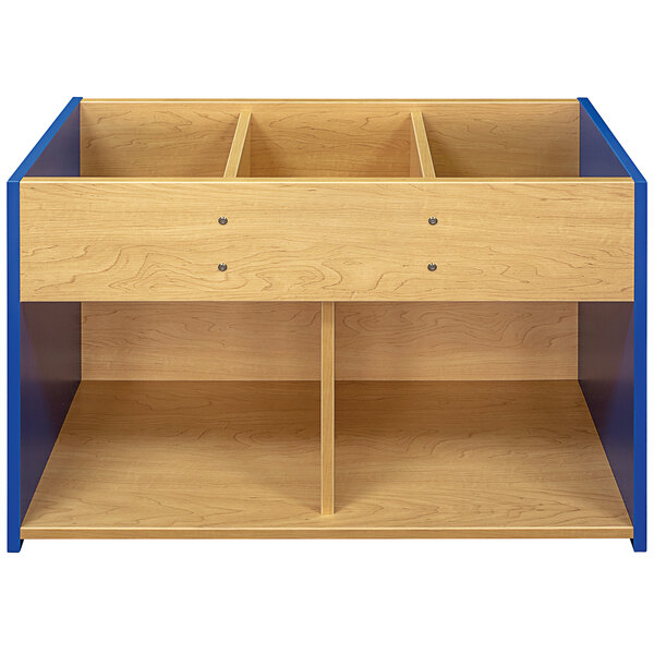 a wooden shelf with four compartments
