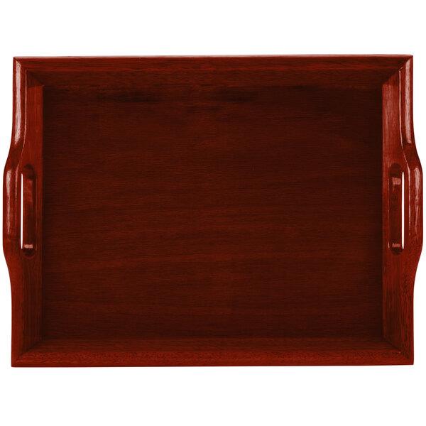 A mahogany hardwood room service tray with handles.