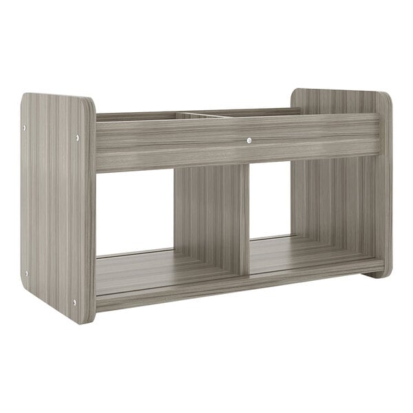 A wooden Tot Mate shadow elm laminate book and toy storage shelf with two shelves.