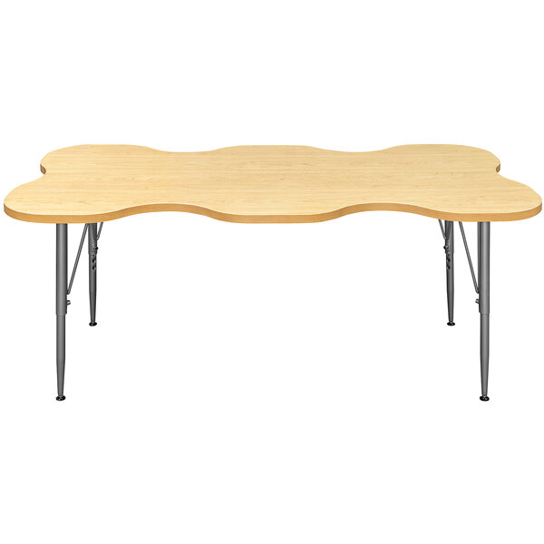 A Tot Mate rectangular maple laminate table with legs and an adjustable height.