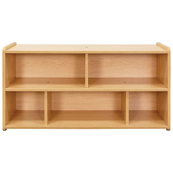 A maple laminate Tot Mate toddler compartment storage unit with shelves.