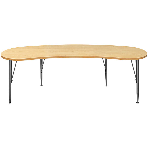 A Tot Mate maple curved rectangular table with legs.