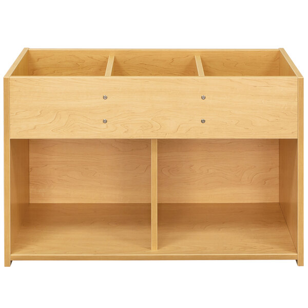 A maple laminate Tot Mate bookshelf with two shelves and four compartments.
