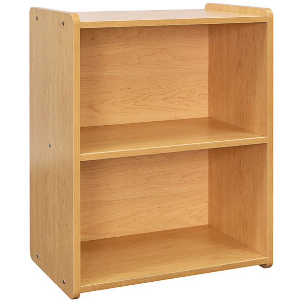 A Tot Mate maple laminate preschool play center with two shelves.