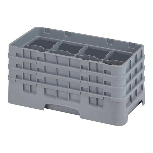 A grey plastic container with compartments and holes.