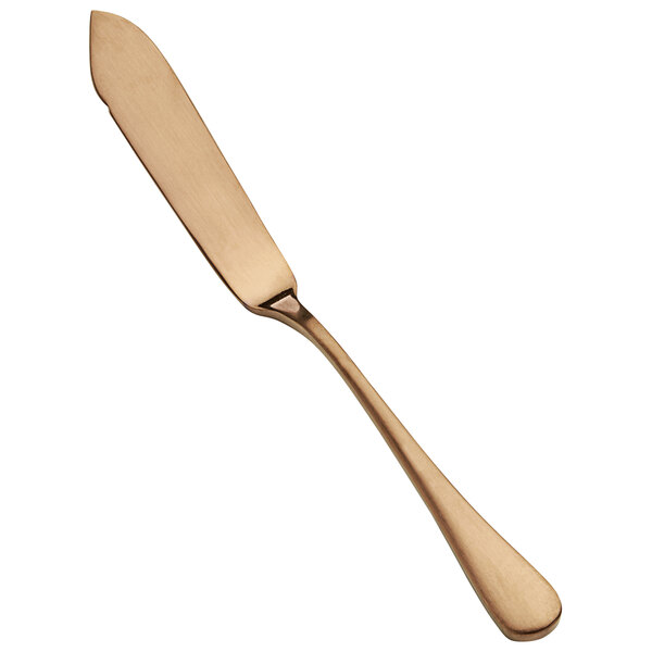 A close-up of a Bon Chef matte rose gold butter knife with a long handle.