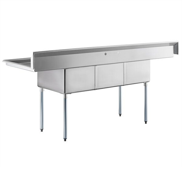 A Steelton stainless steel three compartment sink with 2 drainboards on a counter.