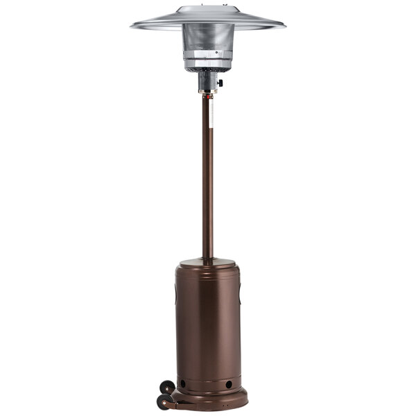 A Crown Verity bronze portable propane patio heater with a round metal base.
