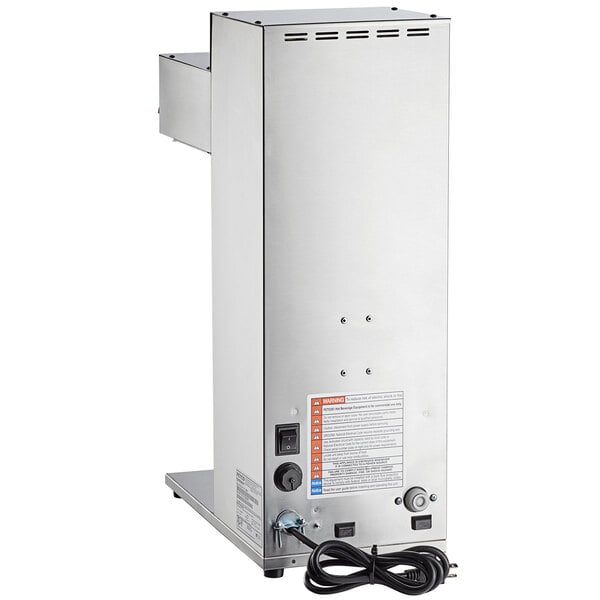 A Fetco CBS-1221 airpot brewer with a small plastic brew basket and attached cord.