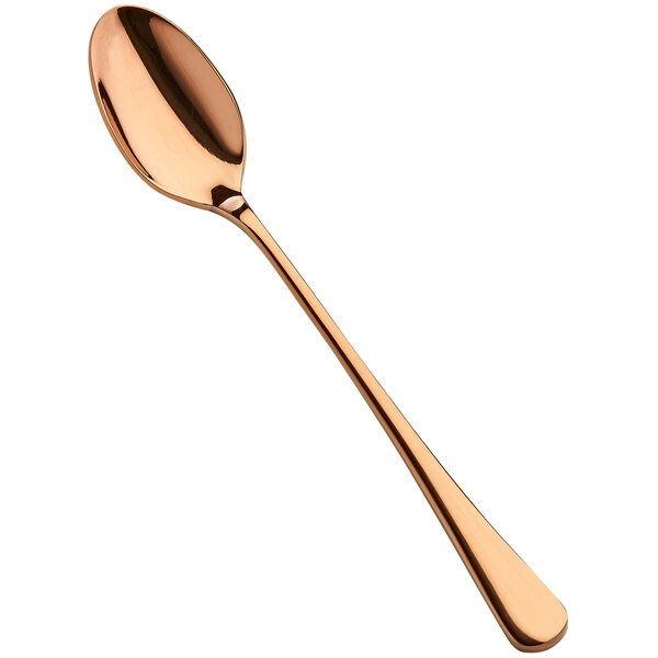 A close-up of a Bon Chef rose gold iced tea spoon with a long handle.