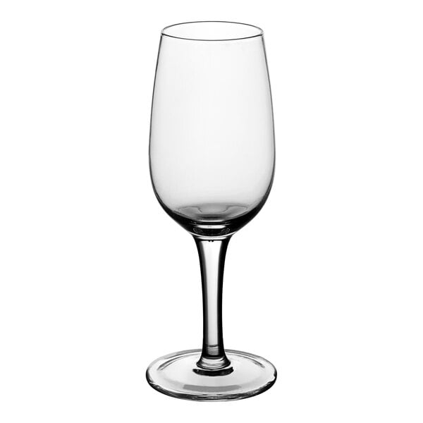 An Acopa Select clear wine glass with a long stem.