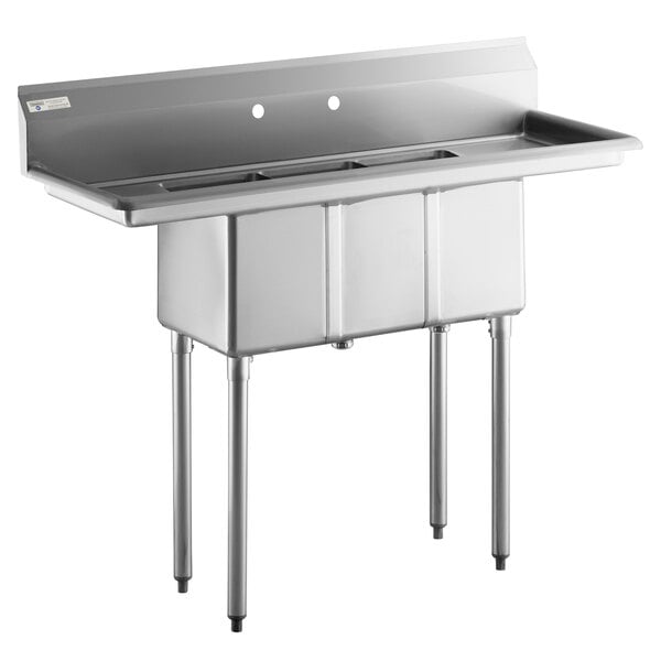 A Steelton stainless steel three compartment sink with 2 drainboards.