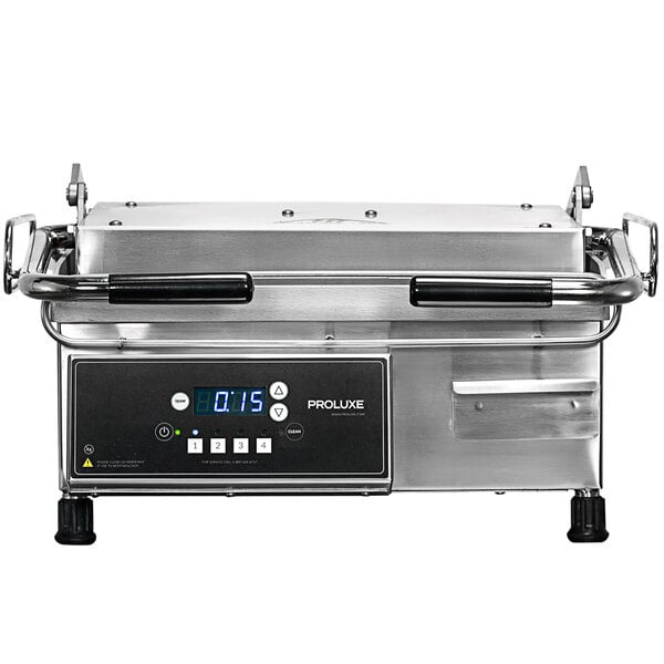 A Proluxe Vantage CS heavy-duty clamshell sandwich grill with smooth plates on a counter in a professional kitchen.