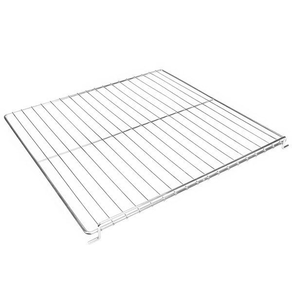 An APW Wyott metal oven range rack with a grid on it.