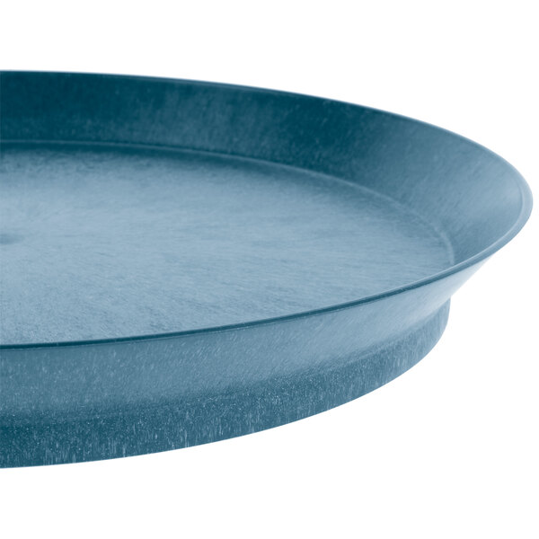 A close-up of a blue HS Inc. polypropylene deli server tray with a short base.