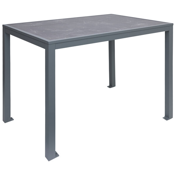 A BFM Seating Pietro bar height table with a soft gray rectangular top and metal legs.