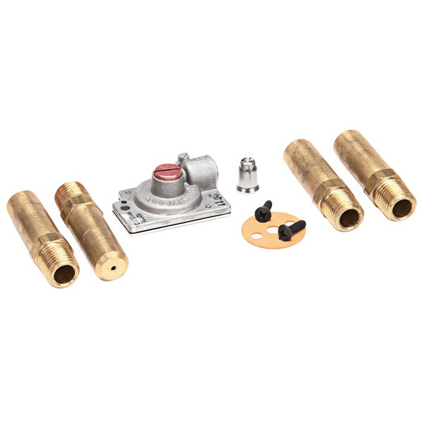 A close-up of brass pipes and a metal object.