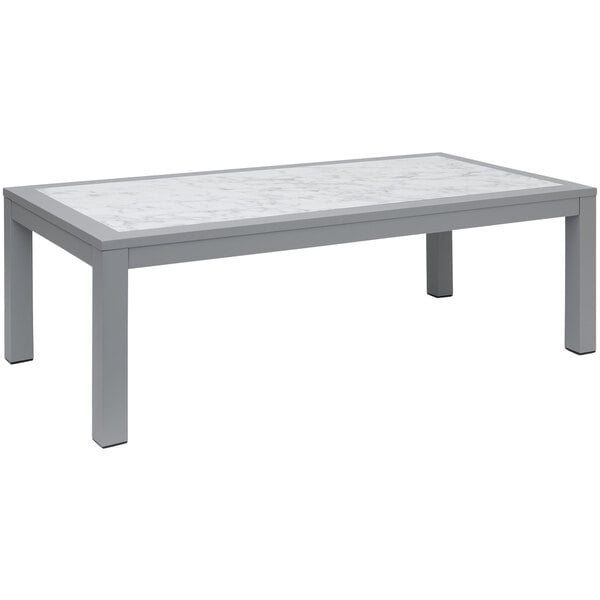 a white rectangular table with legs