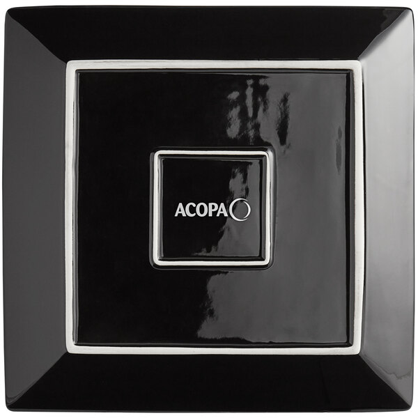 A glossy black square Acopa stoneware plate with white text.