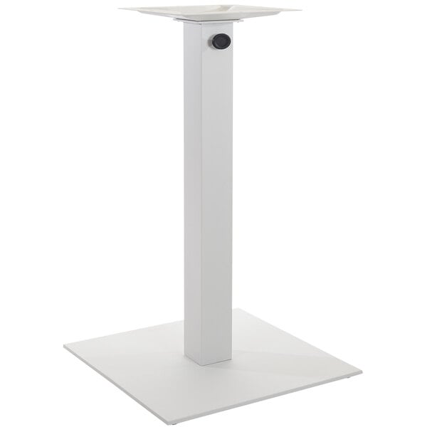 A white square table base with a square hole.