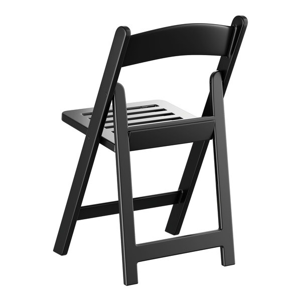 A black resin folding chair with a slatted seat and a curved backrest.