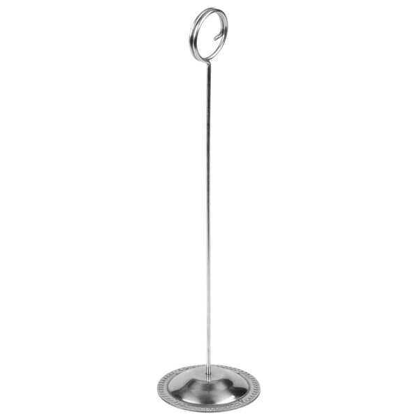 An American Metalcraft stainless steel table card holder with a circular base.