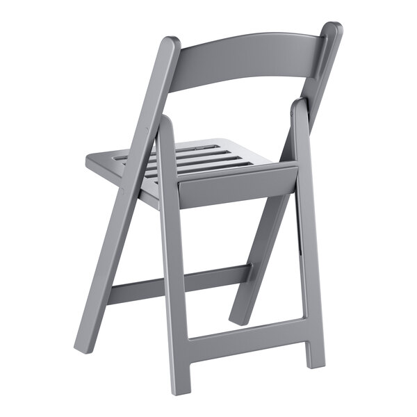 A gray resin folding chair with a slatted seat and backrest.