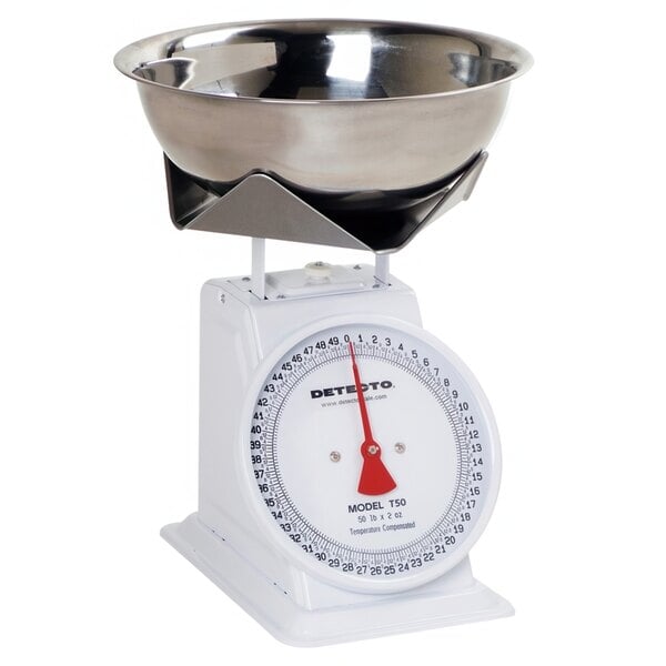 A white Cardinal Detecto mechanical portion scale with a bowl on top.