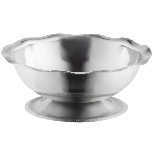 A Vollrath stainless steel round paneled sherbet dish with a round base.