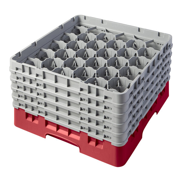 A red and gray plastic Cambro glass rack with extenders.