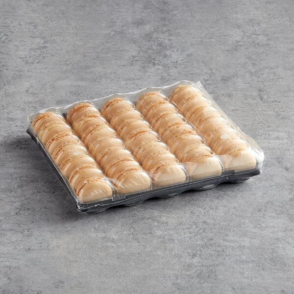 A package of White Toque French almond macarons in plastic