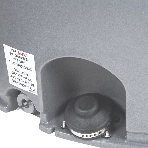 A grey PolyJohn hand sink with a lid and a metal band with a valve.