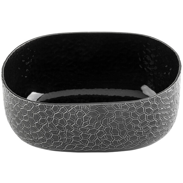 A black aluminum oval bowl with a crackled pattern.