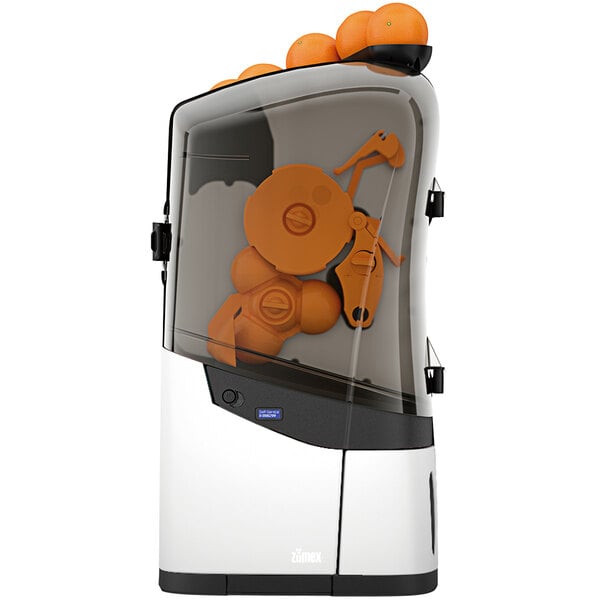 A white Zumex Minex commercial juicer with oranges on top.