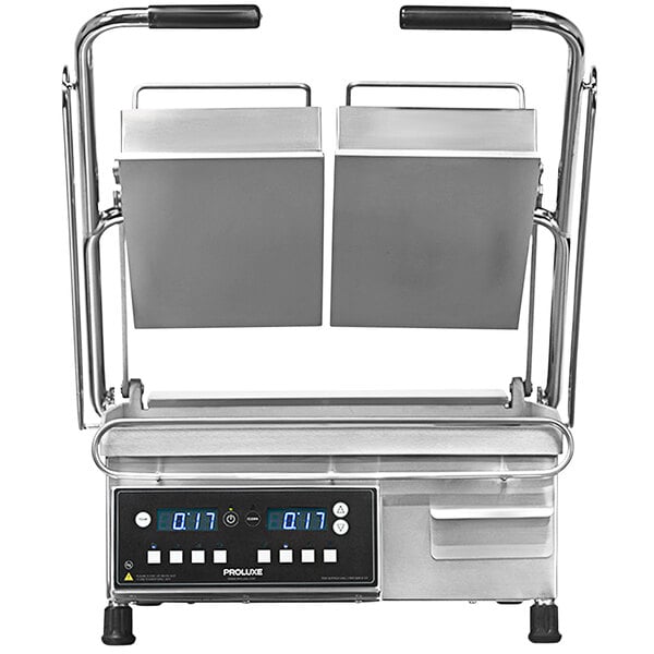 A Proluxe Vantage heavy-duty split lid grill with smooth plates on a counter in a professional kitchen.