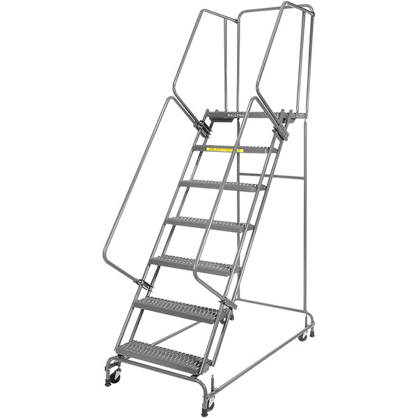 A Ballymore metal rolling ladder with wheels.