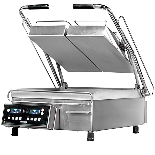 A Proluxe Vantage split lid grill on a counter with smooth plates.