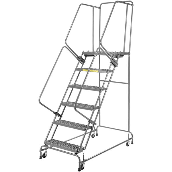 A metal Ballymore rolling ladder with handrail and spring loaded casters.