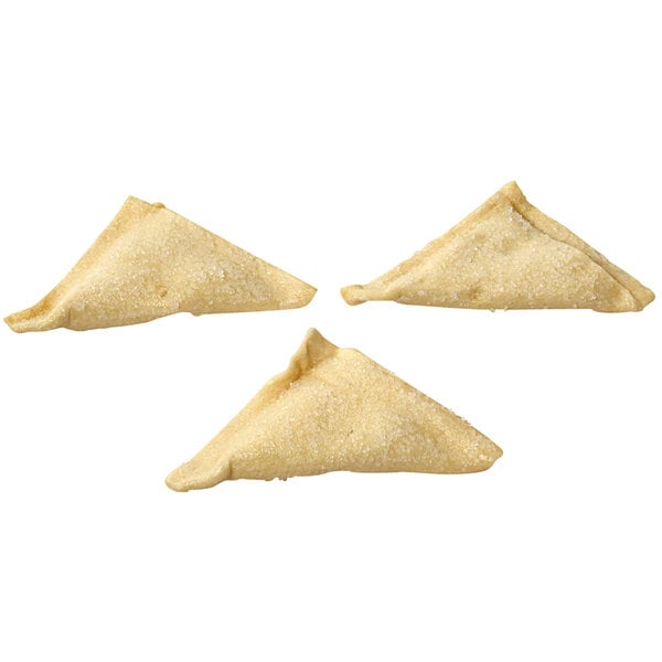 Three triangular shaped Fiera Foods sugared apple turnovers.