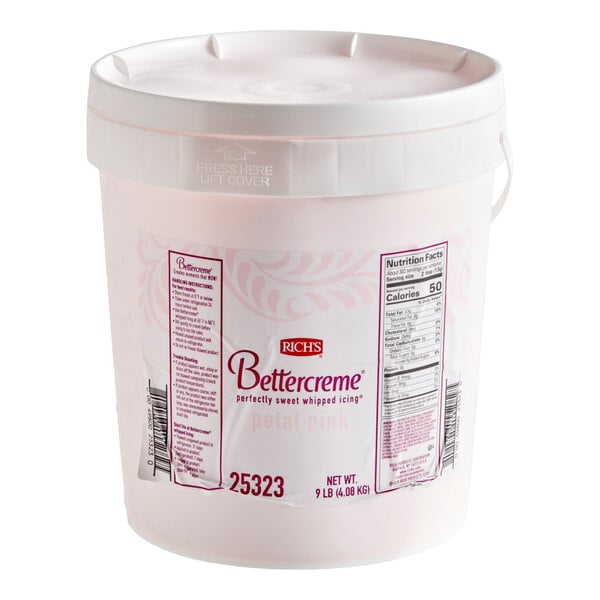 A large white plastic pail with a lid, labeled as Rich's Bettercreme perfectly sweet whipped icing in petal pink, weighing 9 lb (4.08 kg).