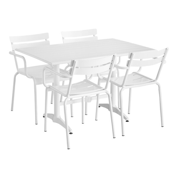 A white Lancaster Table & Seating dining table and chairs.