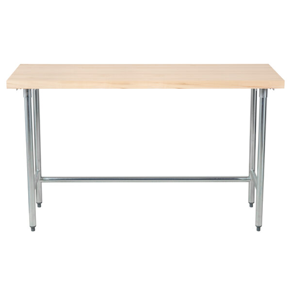 An Advance Tabco wood top work table with a galvanized metal base.