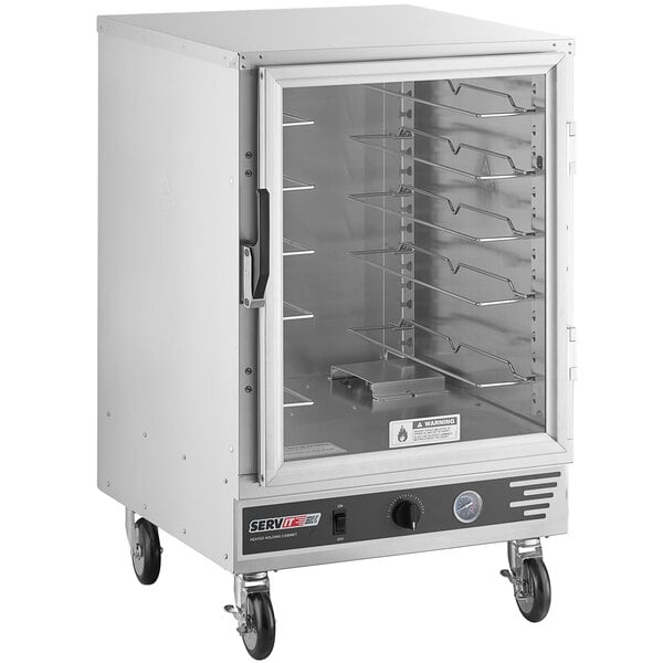 A ServIt holding cabinet with a clear door on a school kitchen.