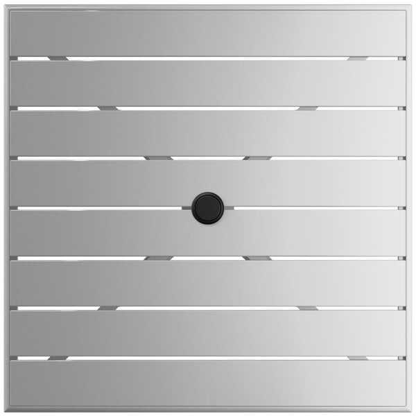 A white square Lancaster Table & Seating outdoor table with a black umbrella hole.