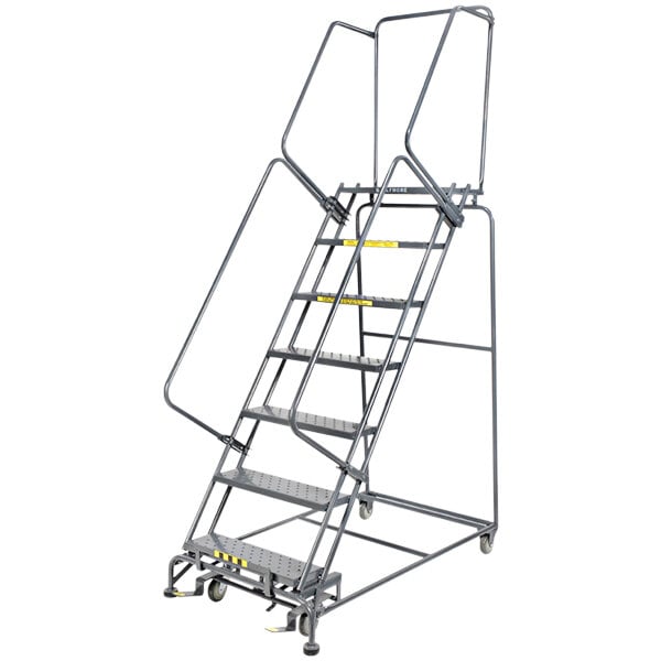A gray steel Ballymore rolling ladder with yellow handles.