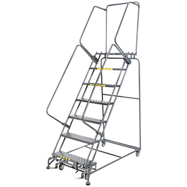 a metal ladder with yellow handles