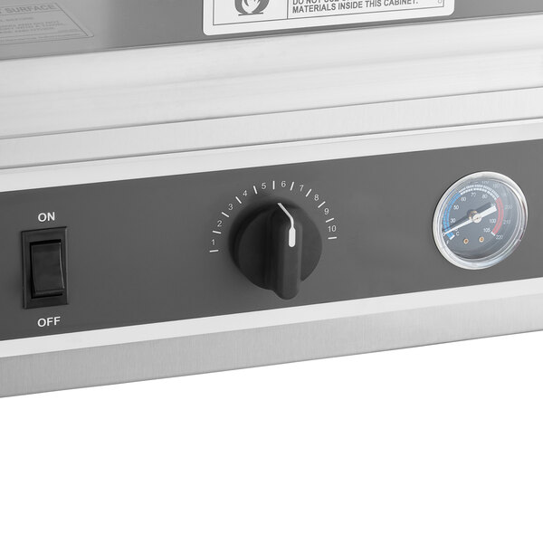 A ServIt holding cabinet with a temperature gauge.