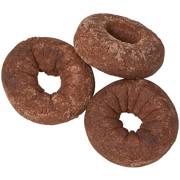 a close up of a brown bagel
